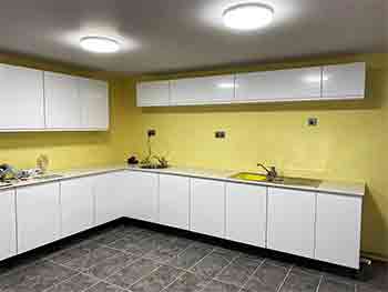Kitchen with pastel yellow walls